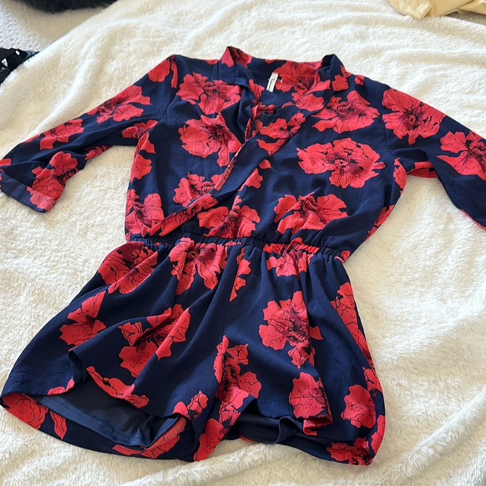 Worn once in perfect condition, blue and red three-quarter length sleeve romper